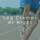 Person experiencing painful calf muscle cramp in the leg at night
