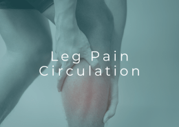 Person holding calf due to leg pain that may be related to circulation problems