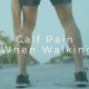 Person holding calf muscle due to pain while walking